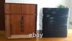 Japanese antique Lacquered table, Wooden Tray Set of 10 in a wooden box, 1925