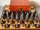 Lewis Chessmen. Replica Isle Of Lewis Chess Set With Burl Root Wooden Box