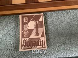 Vintage German wooden chess set, storage box, board and original booklet 1950