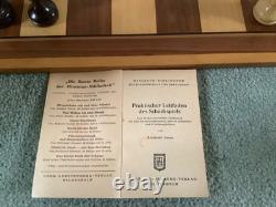 Vintage German wooden chess set, storage box, board and original booklet 1950